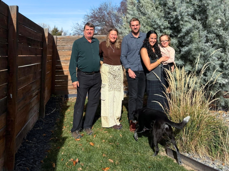 the Ken Bollman Family in a backyard.