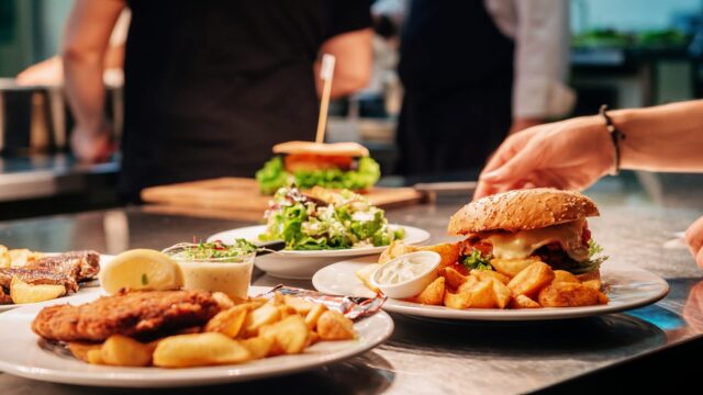 Plating food in a restaurant.