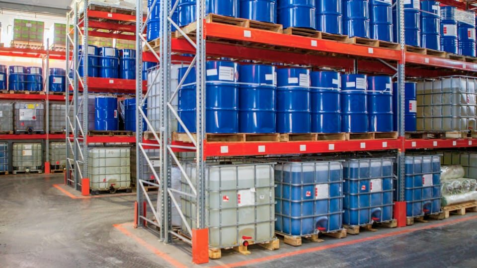 Stacked Barrels in a Warehouse.